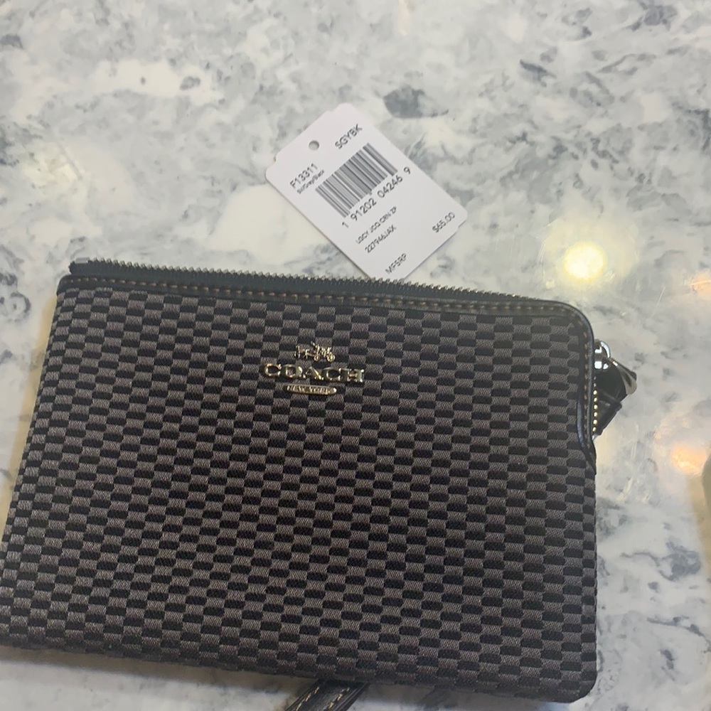 Black and grey coach wristlet